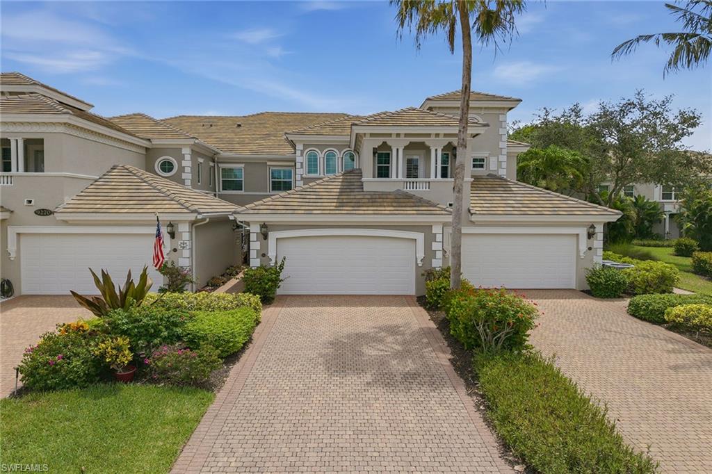 If exceptional quality and refined design are at top of your list, this beautifully renovated upper-floor end-unit coach home in the desirable Varenna Village of Fiddler’s Creek delivers. Offering peaceful southern lake views from a spacious screened lanai, this exquisitely decorated residence is being sold elegantly furnished and features three spacious bedrooms plus a study, three full baths and a two-car garage. Offering 3,029 square feet of living space, it lives like a single-family home without maintenance and has been enhanced with a new air conditioner for added comfort. Filled with abundant natural light, the home showcases elegant finishes, sophisticated furnishings and meticulous attention to detail throughout. A welcoming courtyard entry, paver pathway, new tile roof, new impact windows and electric storm shutters further enhance its appeal and provide peace of mind. Inside, 17-inch porcelain tile flooring laid on a 45-degree angle flows throughout the main living areas, complementing the bright and airy open layout designed for comfortable everyday living and entertaining. The spacious living and dining areas connect seamlessly to the lanai, creating a wonderful indoor-outdoor lifestyle while framing tranquil lake views. The renovated kitchen is a standout feature, appointed with quality Italian cabinetry, granite countertops, full granite backsplash, crown molding and under-cabinet lighting, along with a flat-style breakfast bar and a sunny eat-in area with bay window. Premium stainless steel appliances, including a French door refrigerator, pair with natural gas cooking to create a space that is stylish and functional. The primary suite serves as a luxurious retreat, featuring direct lanai access through sliding glass doors, peaceful lake views and two walk-in closets. The spa-like en-suite bath features dual sinks, a soaking tub, a separate walk-in shower and an enclosed water closet, creating a private sanctuary for relaxation. Guest accommodations are equally impressive, including a guest suite with its private balcony, offering comfort and privacy for visiting family and friends. The additional guest bedroom and dedicated study provide flexibility for a home office or extra sleeping space. Additional features include a well-equipped laundry room with a utility sink, countertop and storage, plus space for an optional private elevator if desired. Every detail has been thoughtfully considered to enhance comfort and convenience. Residents of Fiddler’s Creek enjoy a premier resort lifestyle with award-winning amenities including resort-style pools, fine and casual dining, state-of-the-art fitness center, spa services, tennis, pickleball, bocce and an active social calendar. The community is known for its beautifully landscaped scenic sidewalks and paths, ideal for recreation, running and biking. Optional golf, marina and beach memberships are available, completing the exceptional Southwest Florida lifestyle.