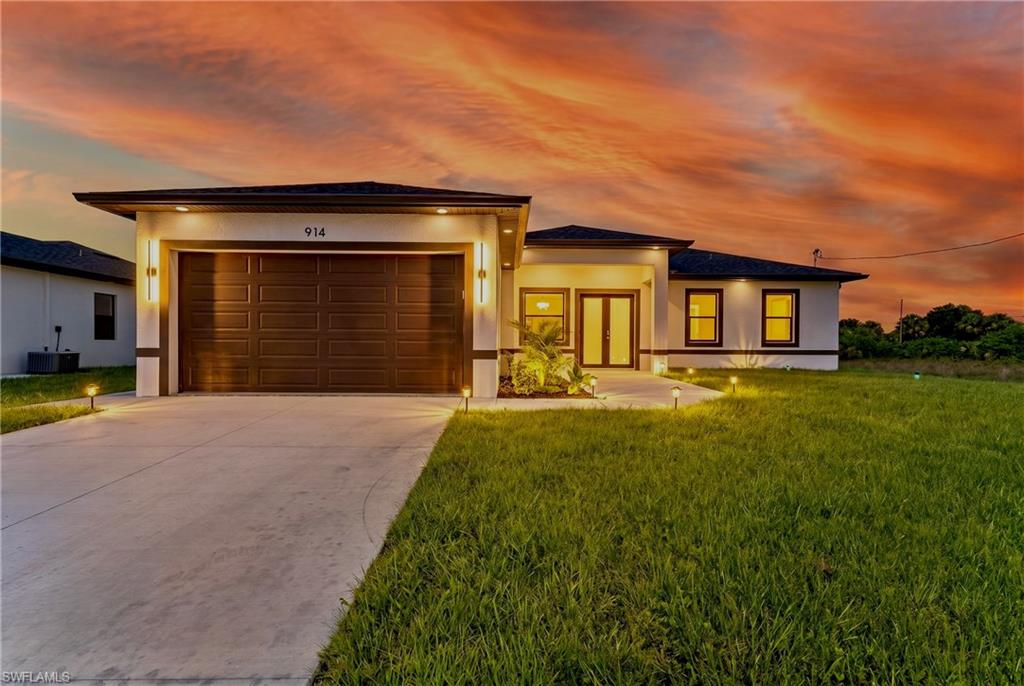 Welcome to this MAGNIFICENT 2026-BUILT, completed 4-bedroom, 2-bath home nestled away on a quiet street just minutes to state road 82 & a quick commute to Fort Myers. This GRAND elevation, featuring flattering DOUBLE FROSTED front doors, showcases HIGH ceilings, including 8FT interior doors, plus decorative light bars at the entrance.

The home highlights impressive oversized porcelain tile throughout, gorgeous QUARTZ countertops & backsplash, and an inviting breakfast bar. The kitchen boasts smart Samsung STAINLESS STEEL appliances and modern European SOFT CLOSE cabinetry with lazy Susan & pantry.

Enjoy a desirable tiled back patio great for entertaining & a walkway access around to side door garage with EPOXY flooring. 

The property is nicely landscaped & includes an irrigation system.

The primary bathroom features an outstanding tiled walk-in shower with multiple showerheads, built-in niches, and a FRAMELESS glass door, along with awarding dual-sink vanities including backlit LED mirrors.

Additional features include IMPACT WINDOWS & DOORS, excellent HIGH-SPEED internet, dazzling premium hardware & fixtures, pendant & recessed lighting, tv ready wall mounting, and generous dual WALK-IN closets in the master.

The exterior offers a modern-designed driveway with walkway and garage side-door access, a welcoming extended entrance, plus a laundry room under air with a utility sink.

This property is NOT IN A FLOOD ZONE, just minutes from all major amenities.

Schedule your showing today!