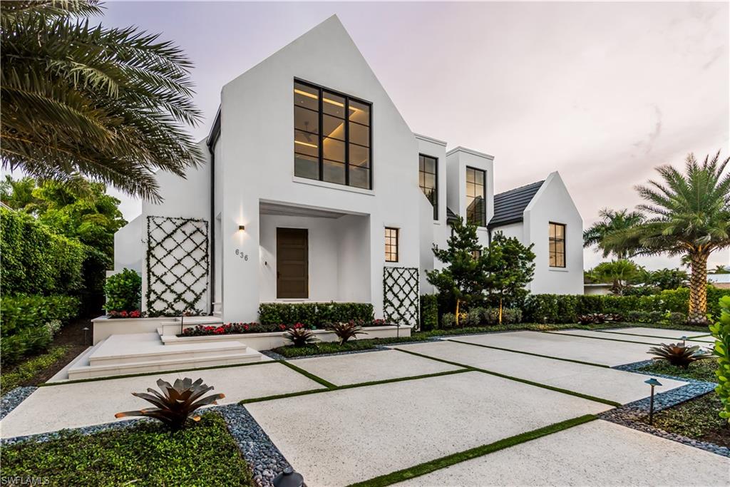 Newly built custom home designed by Harrell & Co Architects and Laura Hay Decor and Design is located just blocks from 3rd St. South and the Gulf of Mexico's white sand beaches.  This home offers four bedrooms with en-suite baths and two half baths, a den, and three car garage.  The open concept interior includes custom cabinetry and millwork, Wolf and Subzero appliances, floor to ceiling glass and architectural ceiling detail throughout opening to a large outdoor living area complete with a summer kitchen overlooking the pool and spa. There is an oversized sun/lounge area with artificial turf for sunbathing taking advantage of the Southern exposure. Other highlights of the home includes Moncer European oak floors throughout, Lurton lighting system, elevator, Lurton shades on all windows, temperature controlled wine room, whole house generator, natural gas and electric roll down screens and shutters. Located on one of Olde Naples most desired streets!