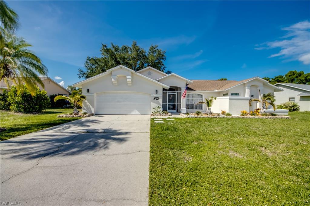 Welcome to Country Oaks, set on a quiet cul-de-sac, this fully updated 3-bedroom, 2-bath pool home offers over 1,800 square feet with a functional split-bedroom, open-concept layout.  This home has been extensively remodeled and is truly move-in ready with new flooring throughout, a fully remodeled kitchen with granite countertops, new refrigerator and microwave, a brand-new primary bathroom (2025), fresh interior and exterior paint, and updated landscaping. Designed for everyday living and entertaining, the home features two living areas, vaulted ceilings, and abundant natural light. The spacious primary suite includes a walk-in closet and spa-style bath with dual sinks, soaking tub, and separate shower.  Enjoy true Florida living in the screened lanai featuring a pool, hot tub, and extended outdoor dining patio surrounded by privacy landscaping.  Located in an established HOA community with a low monthly fee, residents benefit from maintained neighborhood standards and consistent curb appeal without high carrying costs. Conveniently close to FGCU, Gulf Coast Town Center, Miromar Outlets, shopping, dining, and RSW Airport.