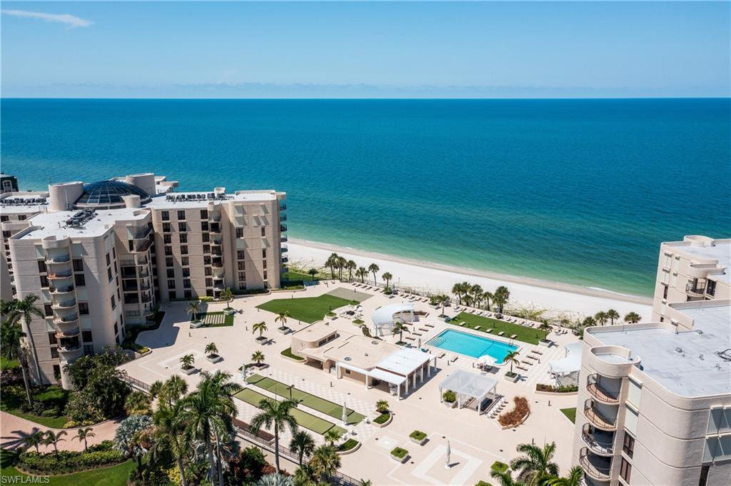 Experience the epitome of luxurious coastal living with this elegant rental offering at 3115 Gulf Shore Boulevard North, Unit 203S, Naples, FL. This stunning 2-bedroom, 2-bathroom condominium provides 1,505 square feet of beautifully decorated space, where every detail is crafted for comfort and style. The first impression is truly elevated by the newly updated ground floor entrance and lobby area, which sets a sophisticated tone the moment you arrive.

Step into a world of refinement with tile floors that guide you through a spacious interior, adorned with tasteful décor. The open floor plan seamlessly connects the living areas to a private balcony, where you can savor partial, yet breathtaking, views of the Gulf. With direct beach access, this waterfront haven invites you to embrace the tranquil sounds of the waves and the gentle sea breeze.

Amenities abound in this exclusive condominium, designed to enhance every aspect of your lifestyle. Residents now enjoy freshly updated fitness facilities, featuring the latest equipment for a premium workout experience. Spend your afternoons at the expansive resort-style pool area, complete with convenient changing rooms, or enjoy a friendly game at the dedicated bocce ball court. The game room and common outdoor spaces offer additional retreats for relaxation and entertainment.

Conveniently located near Venetian Village, this home offers easy access to high-end restaurants and shopping, all while enjoying fabulous Bay views. This turnkey residence is equipped with modern luxuries such as central air conditioning, hurricane shutters, and a walk-in closet. Additional conveniences include an underground covered parking space, laundry facilities in the unit, and elevator access, making this home designed for effortless living. Enjoy peace of mind with a no-pets policy and indulge in the best of Naples living just in time for the high season.