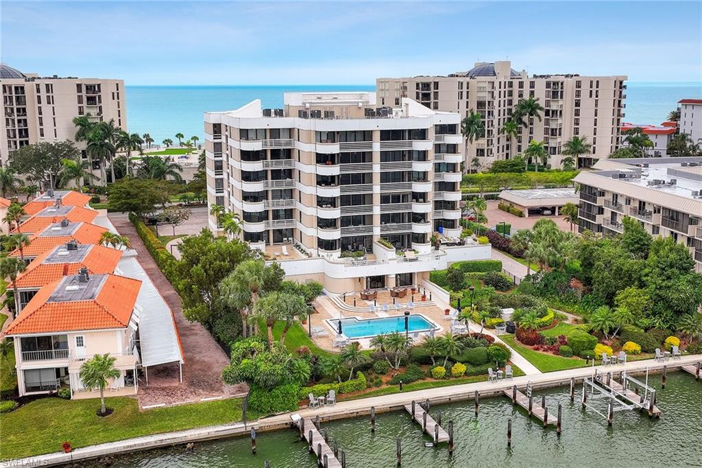 This one-of-a-kind, beautifully renovated penthouse overlooks expansive views of Moorings Bay.  The spacious, three-bedroom plus den, three-bathroom condo is a true rarity. Boasting a custom-built, fully updated kitchen featuring marble countertops, stainless steel appliances and a sit-down island. Enjoy serene water views from the open living area and all bedrooms, while two large terraces complete the private outdoor space. The unit is being offered fully furnished to allow immediate occupancy and enjoyment. Lucerne is a low density building with only 24 units. With easy access to the fine dining and shopping at Venetian Village, 5th Avenue and the Moorings Golf & Country Club, complete the ease of the Naples lifestyle. Boat slips are available to lease and added features include exterior storage, on-site manager, an outdoor grilling area and a peaceful community pool with deeded beach access directly across Gulf Shore Blvd.