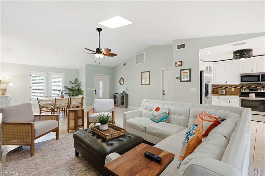 Welcome to effortless Florida living — with income potential built right in. This beautifully updated home offers the perfect blend of comfort, style, and investment opportunity in the sought-after River Reach community.

Step inside to a thoughtfully designed layout featuring multiple dining spaces, a split-bedroom floor plan, and soaring volume ceilings. Southern rear exposure fills the living spaces with natural light all day long. The kitchen and bathrooms have both been beautifully updated — this home is truly turnkey, so all you have to do is move in and start enjoying it. 

Out back, you'll find your own private retreat: a propane-heated pool under a spacious screened enclosure, a covered seating area, and a separate grilling patio — ideal for entertaining or simply unwinding. Mature fruit trees and a 6' privacy fence complete the outdoor space.

Investors take note: this home comes with a proven short-term rental track record and no rental or pet restrictions, making it a rare turnkey income opportunity in this market.

Living in River Reach, residents can enjoy the neighboring Coconut River community's amenities for a nominal annual fee — including a heated pool, tennis court, 4 pickleball courts, a dog park, playground, pavilion rentals, boat launch, and kayak/SUP storage.

Boaters and paddlers will love the Gulf access via the Gordon River, with the Gordon River Greenway just a few minutes' paddle away. And when it's time to explore, Downtown Naples and the shopping and dining of 5th Avenue are just minutes away, with Lowdermilk Beach only 4.5 miles down the road.