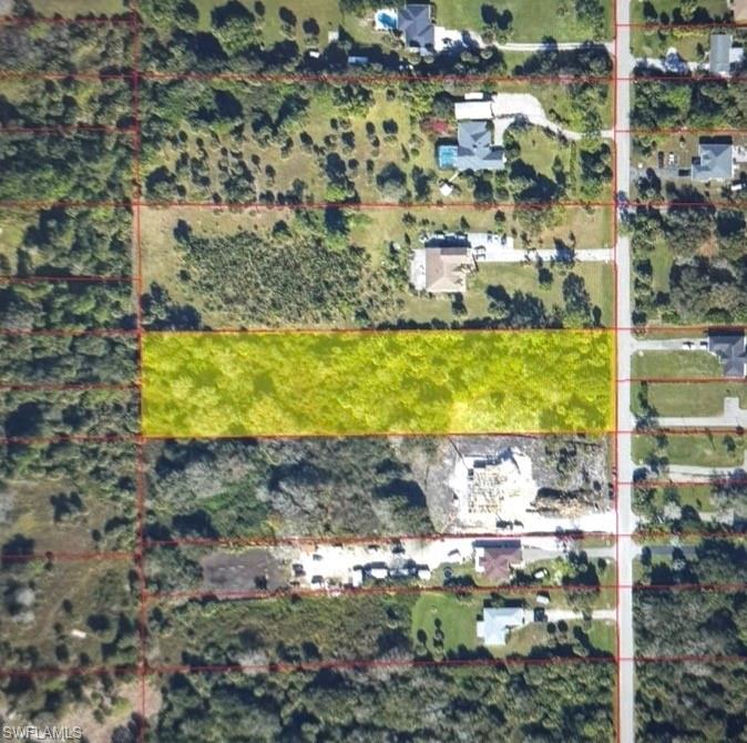 The lot is strategically situated close to several shopping plazas, giving you easy access to restaurants, supermarkets, pharmacies, cafés, services, and other daily essentials. Enjoy the freedom of acreage living while remaining connected to the growing conveniences of Golden Gate Estates and the surrounding Naples area.
With 2.34  acres, there is ample room to design a custom residence, create outdoor living spaces, add a pool, garden, workshop, or simply enjoy the open space and natural surroundings. This is an excellent opportunity for buyers looking for a well-positioned homesite in one of the best areas of Naples Florida.