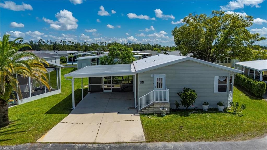 ** Port Charlotte Village was voted #1 manufactured home community in 2024 in Charlotte County** Welcome to this beautifully updated 2-bedroom, 2-bathroom manufactured home located in a desirable 55+ community. NOT in Flood zone, LOW HOA. This charming residence features an oversized driveway and a large screened-in lanai with an attached storage shed—perfect for enjoying Florida’s outdoor lifestyle. Inside, you’ll find brand-new luxury vinyl flooring throughout, fresh interior paint, and a spacious, open layout. The kitchen is a standout with a generous island, an abundance of solid wood cabinetry, and plenty of counter space, making it ideal for cooking and entertaining. Adjacent to the kitchen, the dining room showcases a lovely built-in hutch, while the expansive living room offers plenty of space to relax and unwind. Both bedrooms are oversized and include large walk-in closets, and the primary bathroom is generously sized with a large linen closet. A new roof was installed in 2023 for added peace of mind. This vibrant 55+ community is conveniently located close to shopping, entertainment, elite golf courses, a wide variety of restaurants, and the stunning blue waters of Florida’s Gulf Coast beaches. Don’t miss the opportunity to enjoy comfort, convenience, and coastal living all in one place! Port Charlotte Village is NOT in a flood zone.  Some photos are virtually staged with furniture