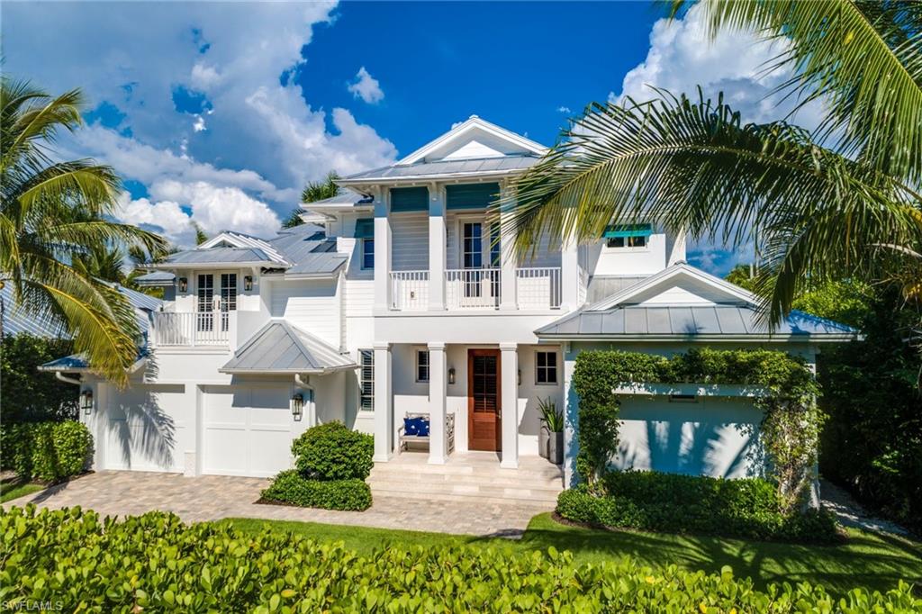 It's all about location! Steps away from the sandy beaches of the Gulf of Mexico, Cambier Park and the extravagant boutiques of Naples on 5th Ave & 3rd St, this home is the sheer embodiment of luxurious living. Built in 2015 by Griffin Builders and exquisitely composed by RG Designs, 935 5th Street South is a custom Olde Naples home that is otherworldly, featuring a coastal interior that is illuminated by an abundant source of natural lighting due to grand Transom windows and French doors. The interior's neutral palette emanates a tranquil stillness throughout, the home's open floor plan centering around a pristine Chef's kitchen that presents imposing Wolf Appliances and a Marble island with an extraordinary leather finish. Three en suite bedrooms provide room for family and friends, completed by an office/den. A beautiful outdoor living area can be found completed by a heated pool and spa, as well an outdoor pool bath. Energy efficient, this home features Andersen Impact windows and doors, a 500 gallon LP gas tank, Lutron LED Lighting, Sonos built-in surround sound, elegant wood floors, and more. Revel in the Naples dream with the convenience of low-maintenance downtown living!