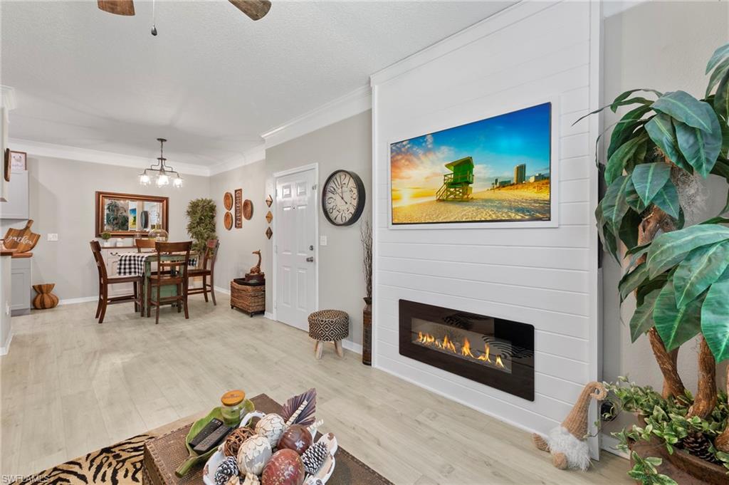Welcome Home to this Beautiful FIRST FLOOR End Unit located in Gateway. Enjoy this cozy Turnkey 1 bedroom plus den 1 bath home with amazing updates. Inside you will find an open floor plan that has laminate flooring, fresh paint, inside laundry area, plantation shutters and a custom shiplap wall with fireplace. Entertain family and friends in your fully remodeled kitchen that has new cabinets, a farmhouse sink and stainless-steel appliances. The private den is a great addition and can be converted into a bedroom if needed. Unwind in your inviting master bedroom that features a spacious closet. Enjoy peace and quiet on your private lanai overlooking the courtyard and fountain. This perfect location puts you steps away from the club house with social area, neighborhood pool, fitness center with inside basketball court. Gateway is conveniently located close to I-75, RSW Airport, Red Sox and Twins Stadiums, Restaurants, Shopping, Churches, Schools, Parks and Hospital.