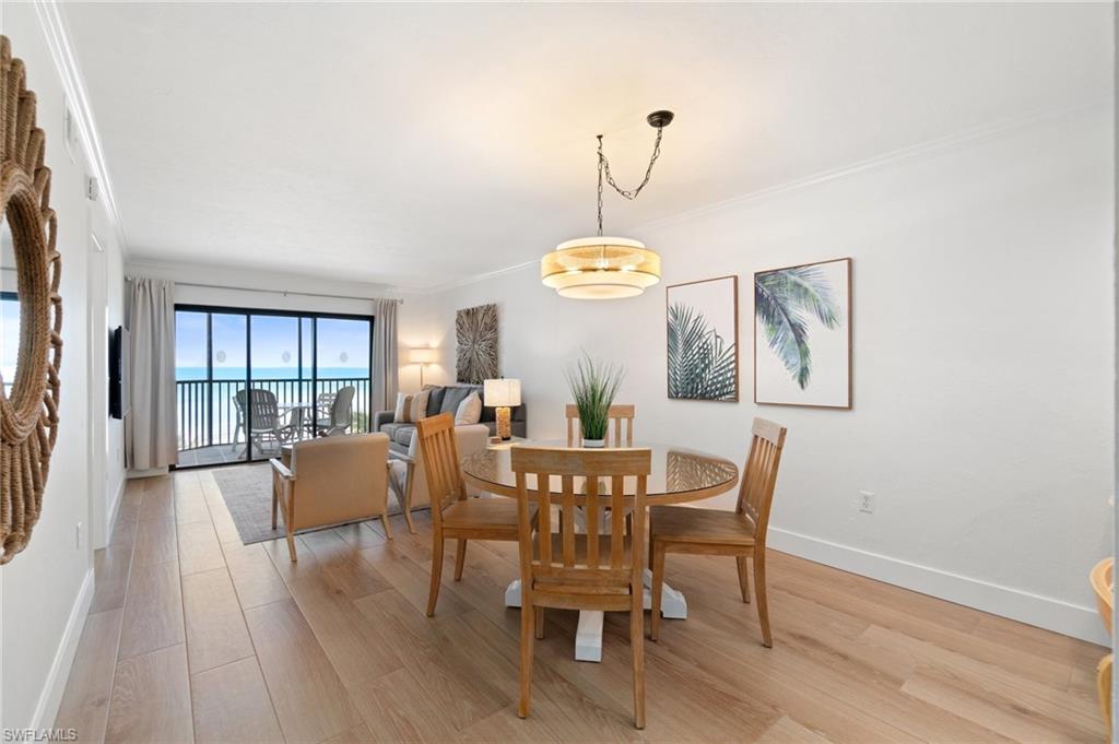 Welcome to this direct beachfront, meticulously remodeled condo at The Riviera Club featuring unobstructed Gulf views spanning from Naples to Sanibel Island. Completely remodeled with over $150,000 in recent improvements, this unit features a beautifully updated kitchen with quality oak cabinetry, quartz countertops and new appliances. Generous seating at the kitchen island pairs perfectly with the spacious dining area. Just off the kitchen, a dedicated office space offers ample storage and functionality. The open-concept layout creates a seamless flow, allowing breathtaking island views from nearly every room. The inviting living area includes abundant seating, a pull-out couch and sliding glass doors that lead to your private lanai. Wake up to dolphins playing in the surf from the main bedroom which offers lanai access, a private en-suite with double sinks, an upgraded tile shower and generous closet space. On the opposite end of the unit, a private guest bedroom provides easy access to a fully updated second bathroom. The recent upgrades feature a new AC system and water heater. This unit is offered turnkey with all new modern coastal furnishings. Ideally situated at the south end of Estero Island, The Riviera Club is within walking distance to Santini Plaza and just a short drive to bustling Times Square, all within a well-managed association that has seen many recent improvements, including a pool and a soon-to-be-constructed clubhouse. The community also allows two-week rentals, offering excellent income potential.