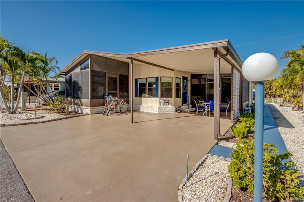 Welcome to island living in the highly sought-after Pine Island Cove 55+ community in Saint James City. This charming 2-bedroom, 2-bath home offers the perfect Florida retreat—whether you're looking for a winter getaway or a full-time residence. This home has an awesome new kitchen cabinets, counter tops, air conditioning, & roof. 
The home features a comfortable open living space with plenty of natural light and a relaxing atmosphere that reflects the laid-back lifestyle of Pine Island. Enjoy outdoor living with space on the side of the home and a large patio in the back to relax and entertain while taking in the peaceful surroundings.                                                                                             
                                                                                                                                                               Pine Island Cove is known for its friendly community and outstanding amenities. Residents enjoy a heated saltwater pool and spa, boat ramp with Gulf access, fish cleaning station, and a washout facility for boats. There is also a scenic lakeside gathering area with covered pavilions, picnic tables, and grills—perfect for socializing with neighbors and friends. Also, a dog park for your pets.

Stay active with pickleball, bocce ball, and numerous clubs and community activities. Boat and RV storage is also available within the community.

Conveniently located near local restaurants, marinas, and world-class fishing, this home offers the best of the Southwest Florida island lifestyle. You own your land and the HOA fee is only $160.00 per month.
