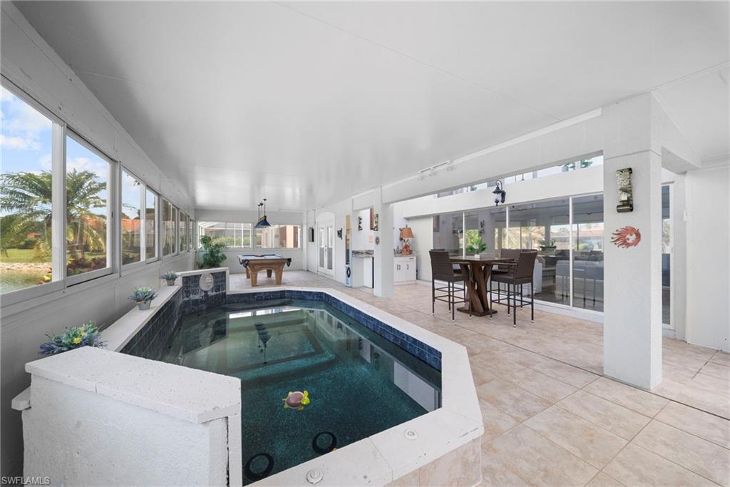 AIR CONDITIONED INDOOR / OUTDOOR LANAI OASIS WITH AN EXTRA LARGE SOLAR HEATED SPA & POOL TABLE - PRIME LOCATION IN THE SABAL LAKE COMMUNITY, NAPLES FLORIDA. FULLY FURNISHED, PET FRIENDLY LONG TERM RENTAL, SLEEPS 6. REMODELED SINGLE FAMILY HOME LOCATED OFF OF RADIO ROAD AND SANTA BARBARA BOULEVARD 

Escape to paradise at this beautifully remodeled lakefront retreat located in the highly desirable Sabal Lake community in Naples, Florida. Perfectly positioned just 15 minutes from Downtown Naples, 5th Avenue, white-sand Gulf beaches, world-class dining, shopping, golf, and entertainment, this spacious 3-bedroom, 2-bath home offers the ideal blend of relaxation, luxury and fun for the entire family!

Step inside and enjoy fresh paint, new flooring, vaulted ceilings, an open-concept layout, and abundant natural light throughout the home. The updated kitchen features white cabinetry, granite countertops, stainless steel appliances, and everything needed for entertaining or preparing meals after an enjoyable day at the beach.

The spacious primary suite offers a peaceful retreat with high ceilings, direct access to the rear lanai oasis and sparkling lake views. The 2 additional guest bedrooms provide comfortable accommodations, while also offering access to the guest bath on the opposite side of the home. 

One of the home’s standout features is the expansive enclosed air-conditioned lanai! This is the perfect indoor-outdoor oasis complete with a heated pool / spa combo overlooking the lake. Enjoy the pool table, dart board and dining area in this year round oasis. 

Residents of Sabal Lake enjoy access to resort-style community amenities including a community clubhouse, heated pool, hot tub, tennis courts, pickleball courts, fitness center, and walking & biking trails all within a quiet and beautifully maintained, prime location, neighborhood setting. At Sable Lake, you are 5 Minutes from nearby shopping, dining and more. 

*Pet Friendly Long Term, FULLY FURNISHED Rental to Cats & Dogs. Limit 2 Per Stay. (Owner Approval is required)
*The Home is available for Long Term Leases of 12 Month 

*All rentals require the HOA Application to be submitted 30 Days Prior to your arrival. Lease may begin after HOA approval is received.
*Background Screenings are required for each adult age 18 + Over. ($50 Per Person)