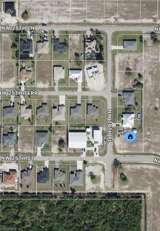 Corner lot in a desirable neighborhood of Cape Coral. Surrounded by newer homes in with great curb appeal. Paved road with electric at the curb. Buy today and hold or build a home for profit. Financing available. Hablo Espanol.