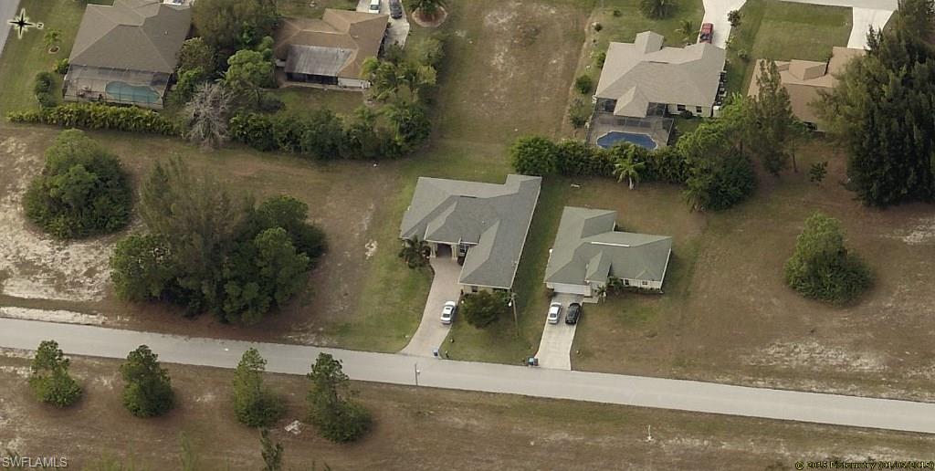 MULTIPLE OFFERS. HIGHEST AND BEST BY 5 PM 11/7. IF YOU ARE LOOKING FOR A HOME THAT HAS BEEN WELL MAINTAINED AND IS BEAUTIFUL AS WELL THIS IS A MUST SEE. BEAUTIFUL CUSTOM BUILT DOUBLE DOOR ENTRY INTO THE GREAT ROOM THAT FLOWS TO THE LARGE LANAI. PLENTY OF ROOM FOR A POOL. SPLIT FLOOR PLAN THAT GIVES YOU PLENTY OF PRIVACY IN THE MASTER. MASTER SUITE HAS A WALK IN SHOWER AND JETTED TUB WITH DOUBLE VANITIES WITH GRANITE. THIS HOUSE HAS A FEW EXTRA BONUSES SUCH AS THE WHOLE HOUSE WATER PURIFICATION SYSTEM, AN ECO FRIENDLY SEPTIC SYSTEM KNOWN AS A AEROBIC TREATMENT UNIT, SOLAR GUARD TINTING FOR THE WHOLE HOUSE WITH A WARRANTY, AND A NEW GARAGE DOOR OPENER WITH WIFI APP INCLUDED. 3 CAR GARAGE HAS PLENTY OF ROOM FOR ALL YOUR TOYS. SET YOUR SHOWING TODAY AND DON'T MISS OUT ON THIS BEAUTY.