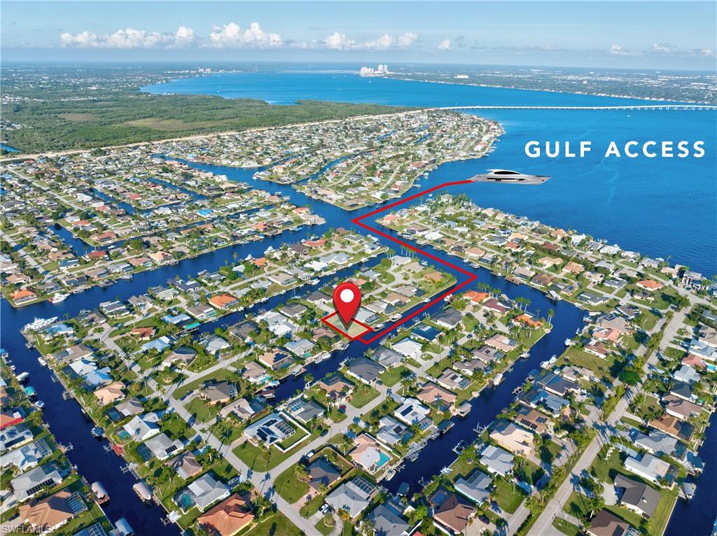 Exceptional opportunity to build your dream home in beautiful Cape Coral, a true waterfront paradise. This prime Gulf-access lot offers direct sailboat access to the Caloosahatchee River and is just a short distance to the open waters of the Gulf of Mexico. Enjoy desirable southern rear exposure, perfect for natural light, warm pool days, and beautiful outdoor living. The seawall is already in place, and assessments are paid in full, adding tremendous value and convenience for future construction. Ideally located with easy access to boating, fishing, nearby beaches, waterfront dining, and the vibrant Fort Myers River District, where you can enjoy restaurants, shops, galleries, entertainment, and the best of Southwest Florida living. Whether you are ready to build your future waterfront residence or invest in one of Cape Coral's most desirable boating locations, this property offers an outstanding opportunity.