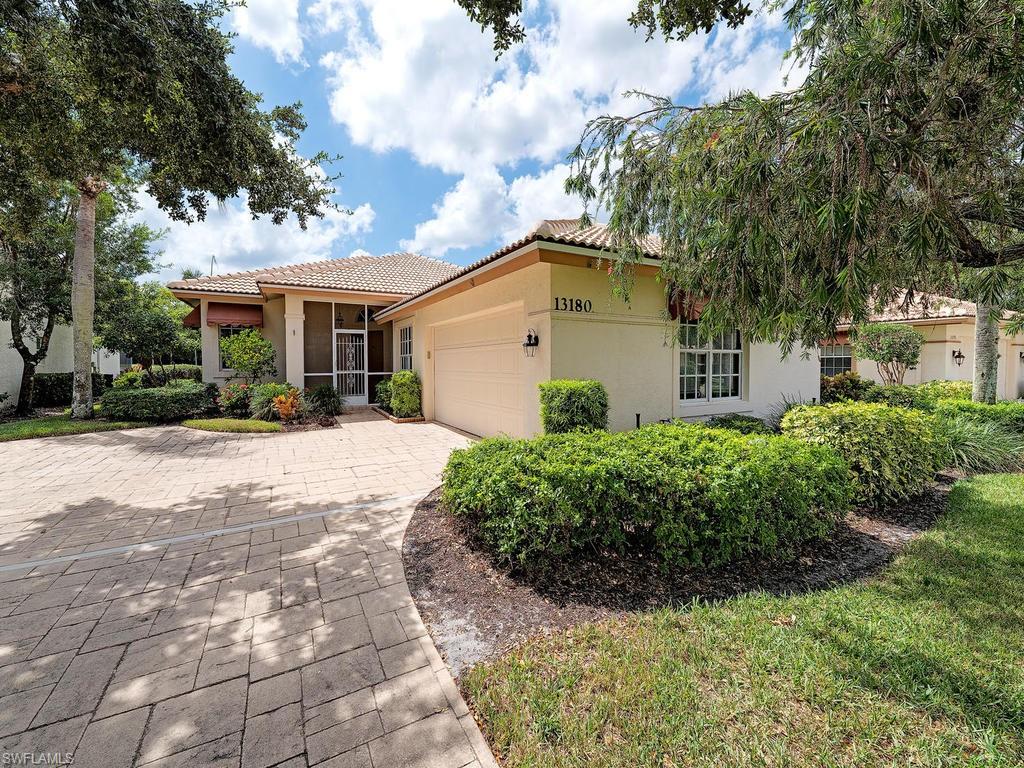 H.15023 - New roof, 3 bedroom villa detached single family with stunning southern exposure lake and golf course views.  Turnkey furnished for $319,000.  Golf included in this amazing value, resort bundled golf community, renewed golf course, stunning community amenity center with super gorgeous bar, chic inside-outside dining, pool, fitness, tennis, pickelball, bocce and more. 24 hour manned guard gate, located adjacent to Quail West with Publix across the street.  Selecting Worthington presents you with amazing views, gorgeous golf course at agreeable pricing. This home allows you an enormous outside living area and a large island kitchen overlooking living area. This floor plan has both an open feeling and a split bedroom for privacy for guests.  The 3rd bedroom has a murphy bed, separate patio and is currently being used as a den. The master suite is at the rear of home looking out to splendid views and has a door going out to lanai patio. Master bathroom with walk-in closet, dual sink on large vanity and separate shower and bathtub.  See photo showing the spacious covered side of patio space where you can have sitting area or outside dining. (Roof 1 year old, AC 3 years old).