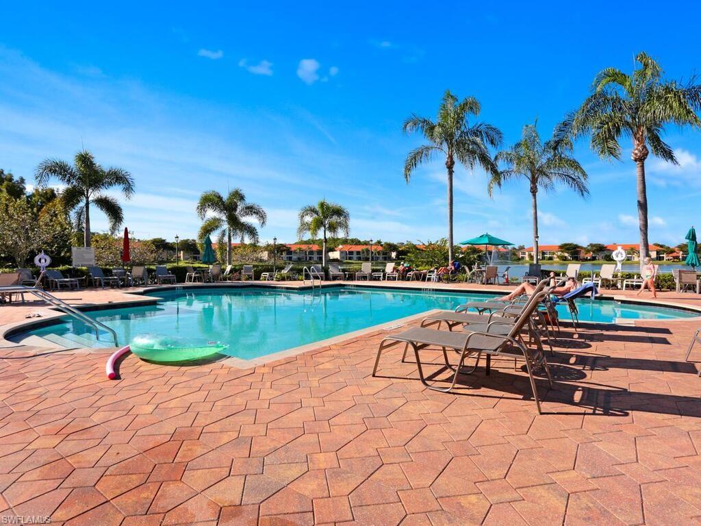 Lovely North Naples condo, conveniently located to everything.  3 full bedrooms, spacious kitchen, end unit, covered parking plus one additional parking place, and a storage room.  This home has been meticulously maintained.  Desirable community of Huntington Lakes is conveniently located six miles from the gulf, close to shopping, restaurants, I-75, 25 minutes to the airport, 20 minutes to downtown and beaches.  This active community features 3 pools, a clubhouse, fitness center, spa, sauna, tennis, bocce, walking, biking.  You are going to love it here!