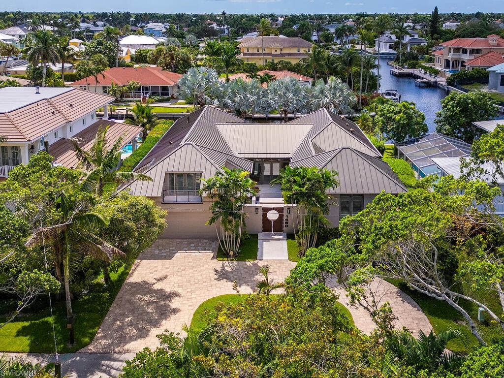 Waterfront Luxury on Jewel Box Avenue located in Oyster Bay. The only street in Naples that is dual waterfront lots! Waterfront access on BOTH front and back sides of the property, with two 65 foot private docks , this property is a boater’s dream, providing easy access to the Gulf.

Welcome to your private slice of paradise in the heart of Naples. Under 5 minutes from the 5th Avenue, shopping and dining, and 7 minutes to the Beach. This beautiful custom waterfront residence on sought-after Jewel Box Avenue offers the ultimate Florida lifestyle with exceptional indoor-outdoor living. Custom built to the highest standards by BCBE . The one of a kind architecture and landscaping provide a truly custom home. 

Designed for both relaxation and entertaining, the home features a sparkling pool, spa, and a front outdoor courtyard that sets the tone for resort-style living. The split bedrooms all en-suite , allow for maximum privacy.  Enjoy evenings by the fully equipped outdoor kitchen while taking in tranquil water views. Inside you have a walk-in climate controlled wine cellar, wolf/subzero and Miele appliances, a drop down 109" screen and HD projector, and so much more. 

Inside, you’ll find spacious living areas filled with natural light and elegant finishes that complement the home’s open design. The thoughtful layout balances privacy and flow, making it perfect for everyday living as well as hosting family and friends.

From morning coffee by the water to sunset cruises just steps from your back door, this home captures the very best of Naples living.