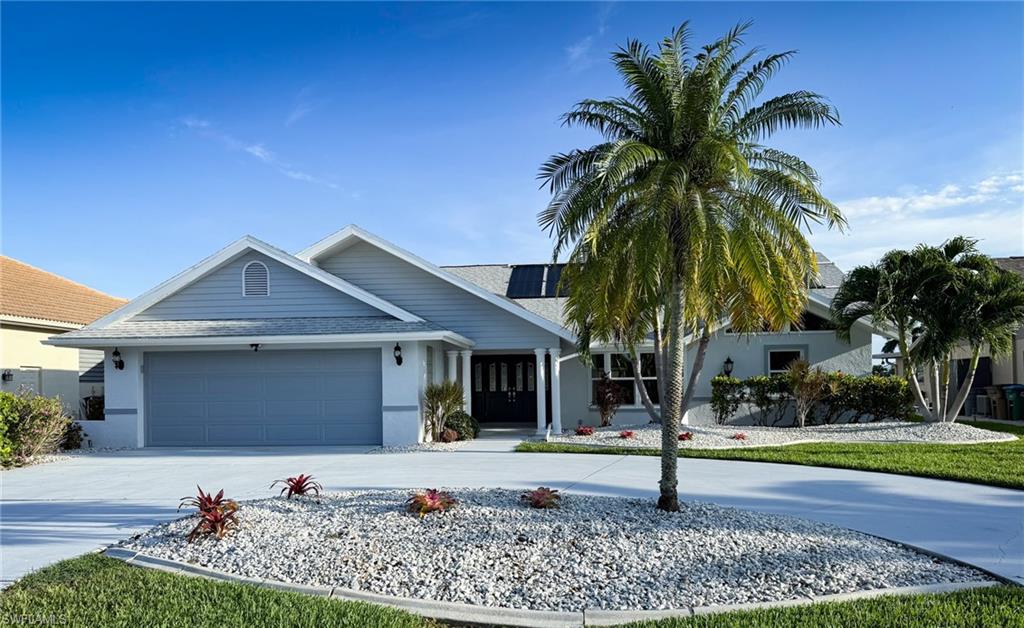 Gold Coast Estates Waterfront Pool Home

Fully Renovated Gulf-Access Home – One Turn to the River!

Welcome to one of the most desirable boating locations in Southeast Cape Coral's prestigious Gold Coast Estates. This beautifully renovated waterfront home offers direct canal access with just one turn to the Caloosahatchee River, making it a boater's dream.

Featuring 3 bedrooms, 2 bathrooms, and an open-concept floor plan, this home combines modern updates with spacious living and exceptional outdoor entertaining.

The heart of the home is a bright, open living area that flows seamlessly into the renovated kitchen featuring quartz countertops, stainless steel appliances, abundant cabinetry, and a large breakfast bar perfect for gathering with family and friends. A versatile bonus room provides the flexibility to serve as a formal dining room, home office, den, or sitting room.

The enormous primary suite is a true retreat, offering approximately 15' x 24' of living space, two walk-in closets, an additional linen closet, dual granite vanities, and a massive custom-tiled walk-in shower.

Step outside to your private waterfront oasis featuring a solar-heated pool, expansive screened lanai with multiple covered seating areas, private dock, and boat lift. Whether you're entertaining guests, enjoying the Florida sunshine, or heading out for a day on the water, this property is designed for the Southwest Florida lifestyle.

Major Recent Renovations Include:
Two brand-new A/C systems
Complete repiping throughout the home
Fully renovated bathrooms
Luxury vinyl plank flooring throughout
Updated lighting fixtures
New ceiling fans
Fresh modern finishes throughout

Additional features include:

Oversized 2-car garage
Circular driveway with ample parking
Pull-down attic stairs for convenient storage access
Mature tropical landscaping
High ceilings and abundant natural light
Gulf-access canal location

This move-in-ready waterfront home offers the rare combination of extensive renovations, quick boating access, a pool, and a premier Gold Coast Estates location.

Live where others vacation and enjoy the best of Cape Coral waterfront living.