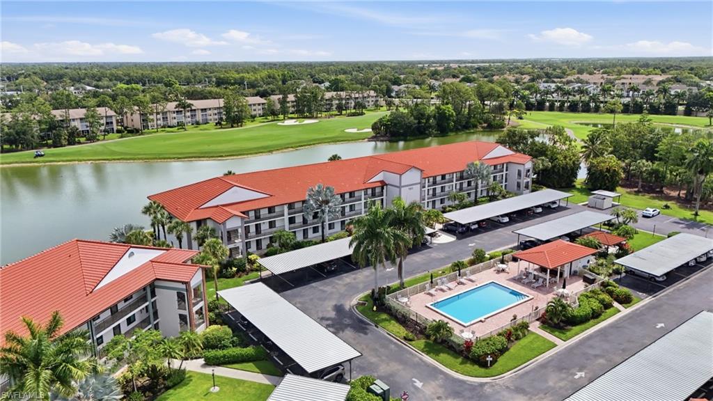 GOLF MEMBERSHIP is INCLUDED in this beautifully maintained, first floor, 2 bedroom/ 2 bath condo within the gates Countryside Golf & Country Club. Your future home is offered fully furnished and features sparkling waterfront lake views, overlooking the Arthur Hills 18 hole, par 70 golf course. The interior of the condo greets you with beautiful hardwood and tile flooring throughout, updated primary bathroom shower, and ultimate peace of mind with 2023 roof, 2019 AC, newer water heater, and 2026 electrical panel. Best of all, the Countryside 2.0 assessments (valued at approx. $10,000.00) have been paid in full by the current owner, a major expense the new owner will NOT have to assume. All you have to do is enjoy this oasis where golf, tennis, and resort style living meet an unbeatable Naples lifestyle. Residents of Countryside enjoy a newly renovated clubhouse, indoor and outdoor dining (3 different dining options) with five star amenity bar and fire pit/conversation areas, resort style pool and spa, 6,300 sq ft. wellness center with state of the art fitness facility, saunas, and physical therapy offerings. This community is not just a golfer's paradise but also offers Har-Tru tennis courts, bocce, pickleball, and a vibrant calendar of social activities and events like Mahjongg, Bridge, Live Music, Bowling, and more. Come indulge in the Countryside Golf & Country Club life and schedule your private showing today!