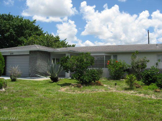 Huge two bedroom home with lake view located on an oversized corner lot.  This split bedroom floor plan boasts of over 1625 square feet per the Lee County Auditor.  It comes completely furnished with all appliances, including washer and dryer.  You don't even need to bring your pots and pans!  The Florida Room is huge and overlooks the lake, it also faces east so you can enjoy afternoons and evenings in this wonderful space.  This home is located in the desirable Willow Lake South Subdivision. The A/C was replaced in 2013, the Hot Water Tank was replaced in 2015 and the Sprinkler System was serviced within the last 6 months.  The carpeting was professionally cleaned in May, 2015.  If you are looking to make an "easy" move, don't miss this fabulous home.  All you need to do is hang your clothes in the closet.  Make your appointment to see this spacious, move in ready home!