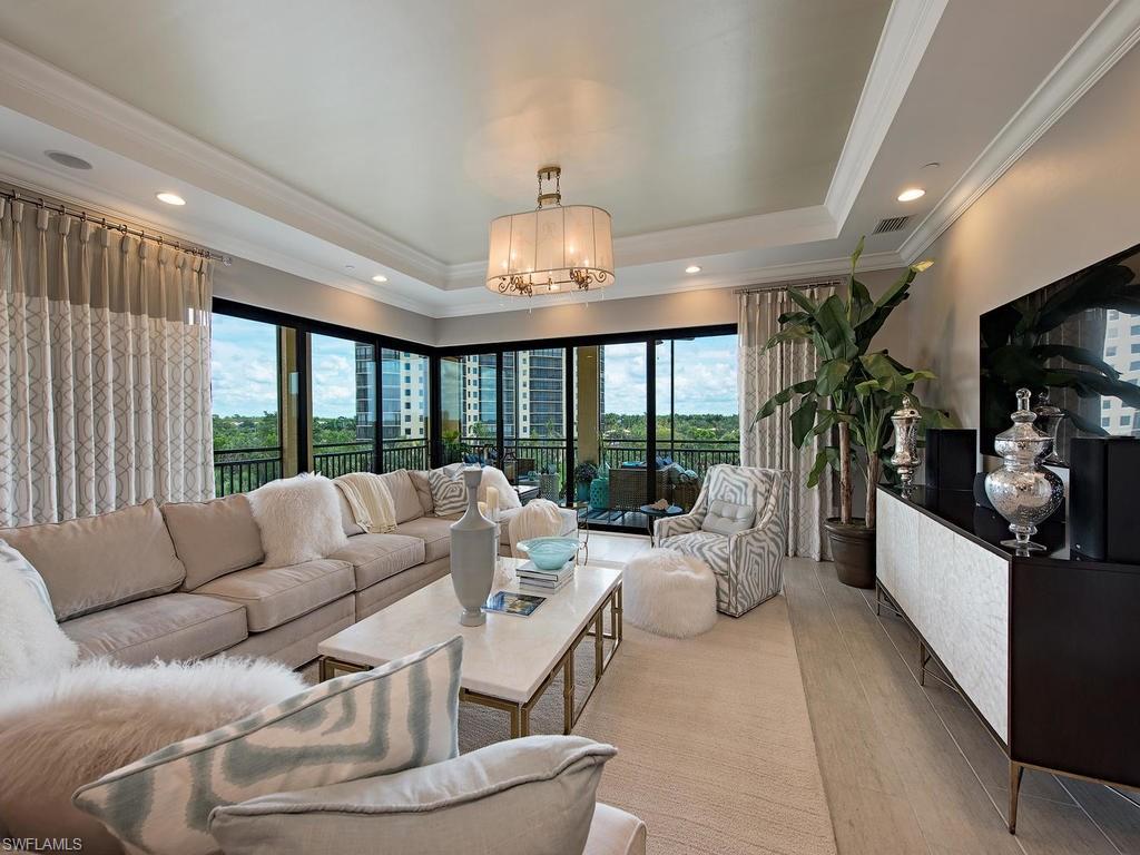 C.14987 - Fantastic Golf Views, in this nearly new, south facing, corner residence at Cielo at The Colony Golf and Bay Club. A Colony fan fan favorite, the perfect great room floor plan with 3,000 SF and 3 en-suite bedrooms and den. The quintessential Florida home with multiple corner sliders pocketing and opening  to large screened lanai with panoramic Colony Golf Course Views. Gourmet kitchen has stainless appliances and side bar area with separate wine and beverage coolers. Master bedroom suite has private lanai and large spa sized bath. The highest offering in storm code building with 155mph windows and sliders. In Cielo, owners enjoy secure elevators serving only 8 residences that open to your own private elevator lobby. This home is a quick walk to Cielo’s private pool. Two spaces in the garage and secure storage are included. The Colony offers the best possible lifestyle with membership to The Bay Club, private beach park, tennis, canoeing/kayaking, sailing club, bocce and the latest sensation...Pickleball!