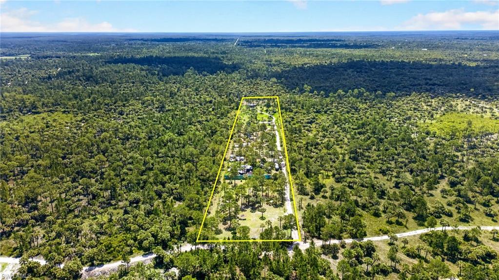 Discover a rare opportunity to own 5 acres of beautiful agricultural land in Naples, Florida, thoughtfully cultivated with hundreds of exotic fruit trees that are maturing and beginning to produce. Enjoy a rich variety of tropical fruits including soursop, jackfruit, passion fruit, and more.  Located near a protected nature preserve, this private and peaceful property offers a true connection to nature with endless possibilities. The property features lush, established grasslands that may be ideal for future animal grazing or hay production, addling even more agricultural versatility and income.  Create your own sustainable lifestyle by growing your own food, expanding the orchard, adding gardens, or developing a self-sufficient homestead surrounded by natural beauty.  This unique parcel presents an incredible opportunity for a private retreat, eco-conscious living, agritourism, or a future Airbnb destination centered around wellness, farm-to-table experiences, and nature immersion. With Naples continuing to grow, this property offers both immediate enjoyment and long-term investment potential. Owner financing may be available, offering added flexibility for qualified buyers.

A rare chance to own a secluded tropical sanctuary where privacy, sustainability, and future opportunity come together. Property is being sold as-is. Buyer to verify zoning, permitted uses, and future building feasibility with the county.