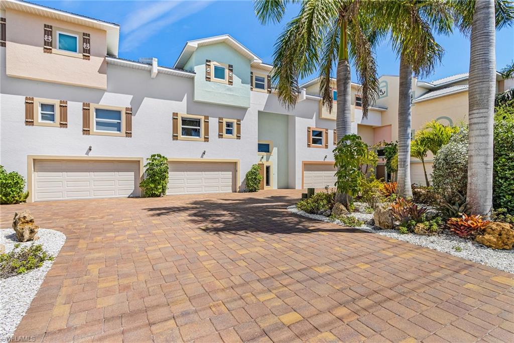 This Boater’s Paradise Waterfront Townhome is ideally located in the village of St. James City on Pine Island. New Townhome #4 at nearly 3800 sq. ft. offers an Unbeatable Waterfront Price per sq. ft. The three spacious living levels are all above the required flood elevation. This beautiful town-home comes complete with a private elevator and is built with solid concrete construction, hurricane windows & doors, firewalls, and a Galvalume metal roof. This quality “Hurricane Proven” home has had no structural damage or flooding. The Townhome is engineered to last forever and provide peace of mind.

The flexible ground level features an open layout with a full bath – ideal for a bedroom, game room, or separate apartment. Additional highlights include a beautifully designed kitchen, 2-car garage, Master Suite with kitchenette, Jacuzzi, and porch with long distance views over the Nature Preserve. Unique Townhome ownership includes your Deeded Private backyard & Private dock. Enjoy direct, unrestricted access to open water for cruising to nearby restaurants, beaches, or your favorite fishing hole. Get ready for Ft. Myers Beach, Sanibel, Captiva, Cabbage Key, Cayo Costa, Boca Grande, & the Gulf of Mexico for your boating playground!

Be sure to view the photos, including virtually staged images for inspiration on how to make this home your own. Owner financing possible, ask for details.