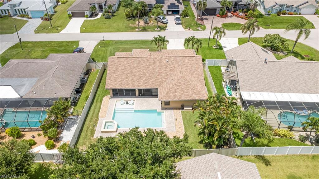 Don't miss this beautifully maintained 3-bedroom, 2-bathroom pool home offering 1,959 square feet of comfortable living space. Designed with both everyday living and entertaining in mind, this home features a formal living room, formal dining room, a spacious family room, and a cozy breakfast area. Step outside and enjoy your private saltwater pool with no screen enclosure, creating an open, resort-style atmosphere. The shallow wading area is perfect for relaxing or giving little ones a safe place to splash and play. Enjoy added peace of mind with a roof that's only 6 years old, a brand-new air conditioning system installed in 2026, and impact-resistant windows throughout.
