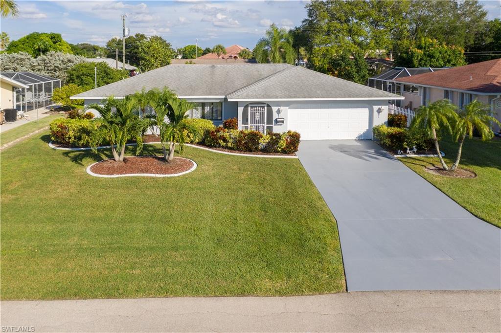 This is a Perfect Starter Home or Retirement Home located in SE Cape. Featuring 3 bedrooms, 2 bathrooms with a 2 car garage. All assessments in and paid, storm shutters, large screened in lanai, and entryway is screened in also. The backyard is spacious enough to add a pool for your enjoyment. Centrally located, close to golfing, shopping, restaurants, hospital, medical offices, both bridges, and a 5 min. drive to the Cape Coral Yacht Club for boating, fishing or dining.  Home is well cared for however it does need some updating. Priced accordingly. Call now before you miss out on this opportunity! Will not last!!