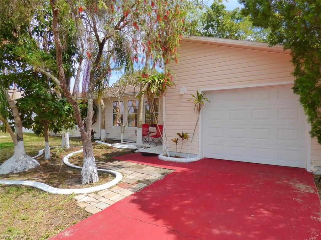 This lovely house is in a great location! Perfect for a first home. Come and see this well-maintained home offering three bedrooms, two full baths, tile, and laminate flooring throughout, updated bathrooms, a newly remodeled kitchen,  a large vinyl fenced backyard with fruit trees, above ground pool, swing sets, and much more.  Located in NE Cape Coral putting you close to the VA Hospital, supermarkets, restaurants, and schools. Make your showing appointment today!!!!