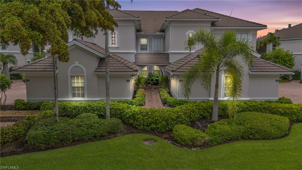 Welcome to 14572 Bellino Terrace #101, an exquisite residence nestled in the heart of Bonita Springs, Florida. This luxurious home is a true gem, offering a perfect blend of elegance, comfort, and modern convenience in the highly sought-after community of Palmira Golf and Country Club.

As you step into this meticulously maintained property, you'll be greeted by a spacious, open floor plan that seamlessly combines the living, dining, and kitchen areas. The abundant natural light floods the space, highlighting the fine details and high-end finishes that set this home apart. 

The master suite is a tranquil retreat, featuring a generous walk-in closet and a spa-like ensuite bathroom with dual vanities, a soaking tub, and a separate glass-enclosed shower. The additional bedrooms are equally well-appointed, providing comfort and privacy for family and guests.

Step outside to your private lanai, where you can relax and soak in the serene views of the lush landscaping and sparkling lake. This outdoor oasis is perfect for entertaining or simply enjoying a peaceful morning coffee.

Living in Palmira Golf and Country Club offers an unparalleled lifestyle with access to world-class amenities. Enjoy the championship golf course, state-of-the-art fitness center, resort-style pool, tennis courts, and a vibrant social calendar. The community is also conveniently located near top-rated schools, fine dining, shopping, and the stunning Gulf beaches.

14572 Bellino Terrace #101 is not just a home; it's a lifestyle. Don't miss the opportunity to own this piece of paradise in Bonita Springs. Schedule your private showing today and experience the luxury and tranquility that this exceptional property has to offer.