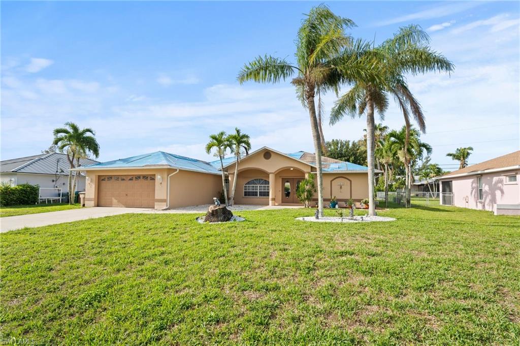 SELLER IS REPLACING THE ROOF so take a look at this beautiful 3 bed, 2 bath, POOL home offering over 1,900 SQ FT and located in the highly desirable and easily accessible Southeast Cape Coral area. The home boasts a spacious, open floor plan perfect for entertaining friends and family. The gourmet kitchen overlooks the family room (w/ gorgeous accent wall), features granite countertops, stainless steel appliances and a breakfast bar, making entertaining a breeze. The master suite is a private retreat w/ sliders to your large pool area, dual sinks, and a walk-in shower. A split floor plan, your guests will enjoy the privacy of having their own wing of the house w/ a well appointed guest bathroom & spacious accommodations. Step outside to your tropical oasis w/ large under cover area and POOL, perfect for enjoying a SWFL sunset or cooling off on a hot Summer day. Located off of Santa Barbara Blvd. & Veterans Memorial Pkwy., you'll enjoy being close to shopping, dining, entertainment & MORE while still having easy access to all Fort Myers has to offer. Whether you're looking for a primary, investment or secondary home, at this price, it's time to MOVE!