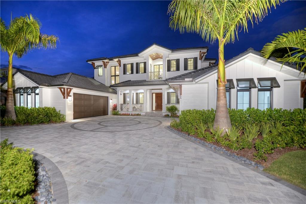 Ideally situated on a quiet street, this new construction property in the Moorings offers an exceptional oversized lot with plans for approximately 4,217 square feet under air. This home features four bedrooms and four full and two half baths large study and a separate Den. The open floor plan provides great space for indoor entertaining and the lushly landscaped, large outdoor area complete with pool, spa , affords the option to enjoy all that Naples has to offer. The outdoor living and entertainment area includes an amazing pool and spa, water falls and a gourmet outdoor kitchen. Solid concrete structures, beautiful hard wood flooring,Pompeii quartz counter tops, solid wood cabinetry, low voltage lighting, all Sub-Zero and Wolf appliances complete this beautiful home.
House is eligible for  Membership to the private Moorings Beach Park.