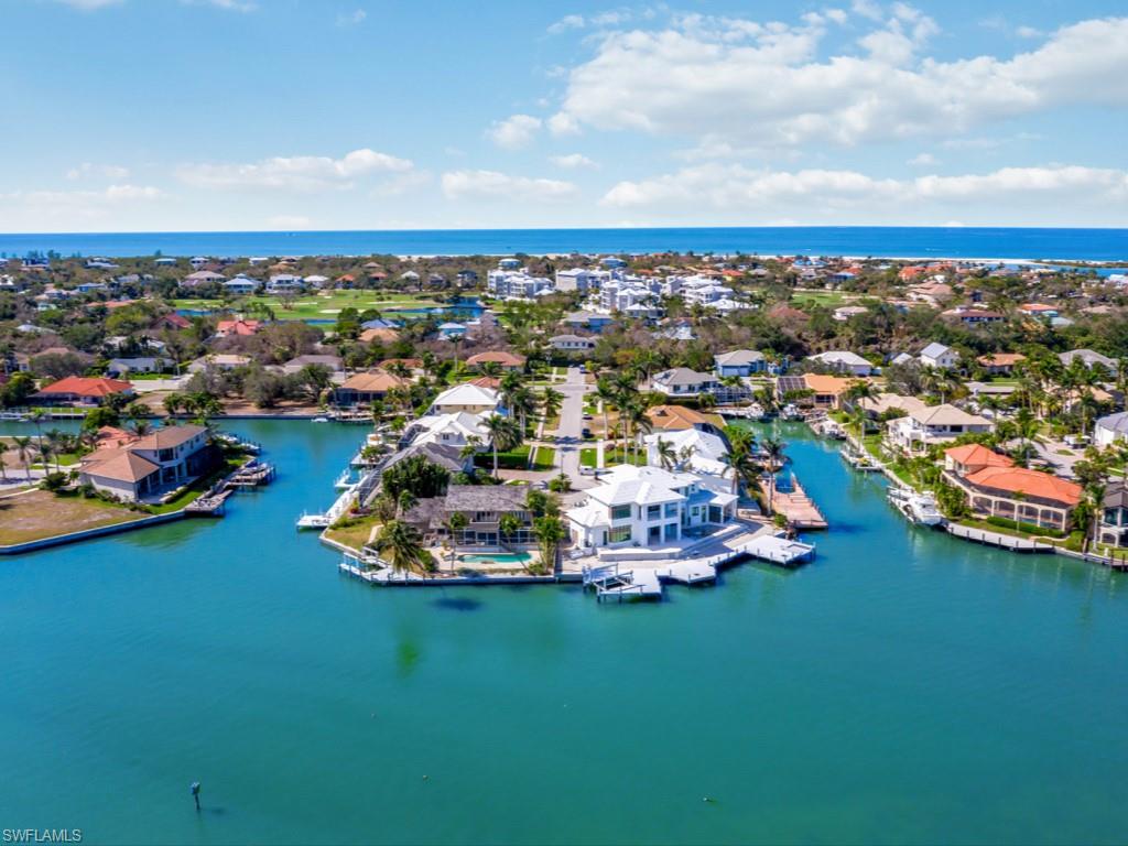 Don't miss this wonderful opportunity to own one of Marco Island's premier waterfront homesites with 167-feet of waterfront overlooking Collier Bay, Stunning wide water views, this property is walking distance to Tiger Tail beach, direct access to Gulf.  Premier location! Property is being sold for lot value only, “as is” where you can simply look over the edge and see thousands of baitfish attracting larger marine life. This is one of the most sought-after locations on Collier Bay, as it allows convenient travel on and off the island. You will enjoy solitude and breathtaking, unobstructed panoramic views as you are tucked on the point of a secluded cul-de-sac. The large water frontage allows for a variety of docking choices for several watercraft without impeding the magnificent view. From your backyard, you can watch dolphins and manatees play, from your dock or take a quick boat ride out to the Gulf of Mexico. This is the perfect location for avid boaters, offering deep-water direct access to the Gulf of Mexico. Build your dream home on this rare lot and enjoy all the lifestyle Marco Island has to offer.