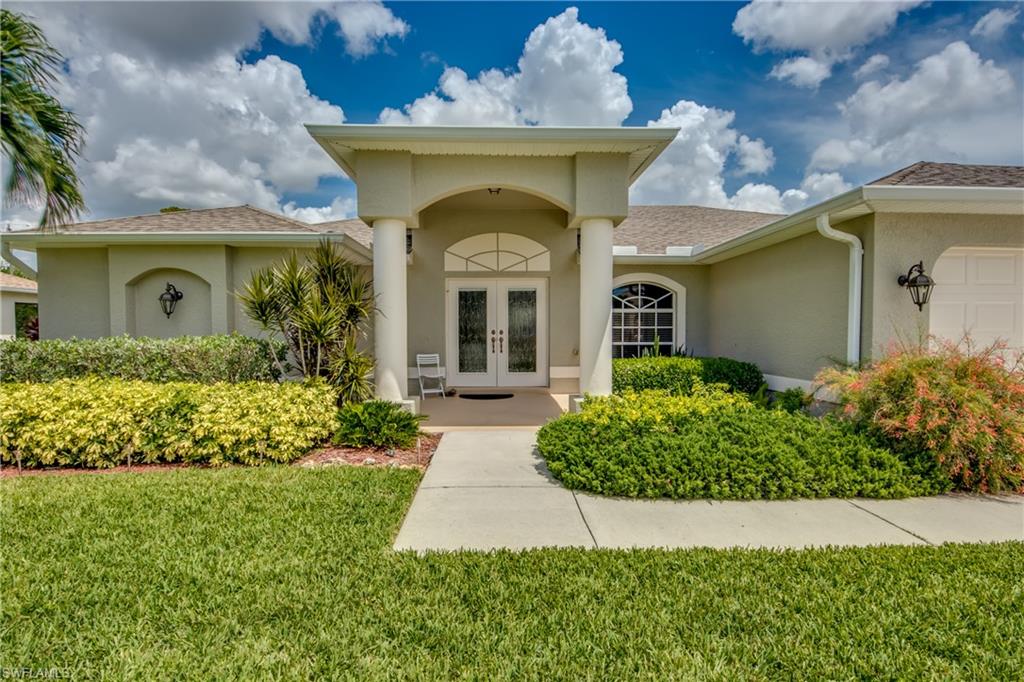 Rare find! Three car garage on two lot site! Save on taxes. One owner - no children, pets or smokers. In highly desired Pelican area. Close to shopping (Publix, Target, Walmart Grocery). Walk to elementary school and only one mile from the Library. Short drive to Home Depot and minutes from Downtown Cape Coral. Quick access to Fort Myers on Veterans or Cape Coral Pkwy. Auto garage doors, insulated and reinforced surge protected. This home boast 4 bedrooms. The Master Bedroom has Two walk-ion closets and an oversized shower with Two showerheads. Whirlpool appliances in Kitchen that has a breakfast bar and a separate breakfast area. Separate laundry room and plenty of storage.