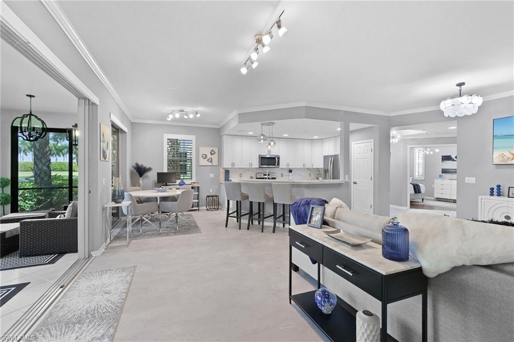 SELLER IS PREPARED TO CONSIDER ALL REASONABLE OFFERS!!!

Beautifully upgraded first-floor residence located behind the main gates of Miromar Lakes, offering exceptional value, thoughtful updates, and desirable peace of mind with HURRICANE IMPACT WINDOWS AND IMPACT SLIDERS.

This 2BR+den/2BA home features 1,654 sq. ft. of well-designed living space with newer luxury flooring, a renovated open-concept kitchen with the wall removed, modernized fixtures, an updated guest bath, newer washer and dryer, and refreshed lanai screens. The den offers excellent flexibility and can function as a 3rd bedroom, guest space, or private office.

Additional highlights include motorized power shades on the sliders, Nest thermostat, MyQ smart garage door opener with upgraded locks, Ring doorbell, and a screened lanai designed for year-round enjoyment. Furniture is negotiable.

Enjoy the award-winning Miromar Lakes lifestyle with 700 acres of freshwater lakes, white-sand beaches, boating, golf, tennis, pickleball, fitness center, spa, waterfront dining, and resort-style amenities—all within one of Southwest Florida’s most celebrated communities.