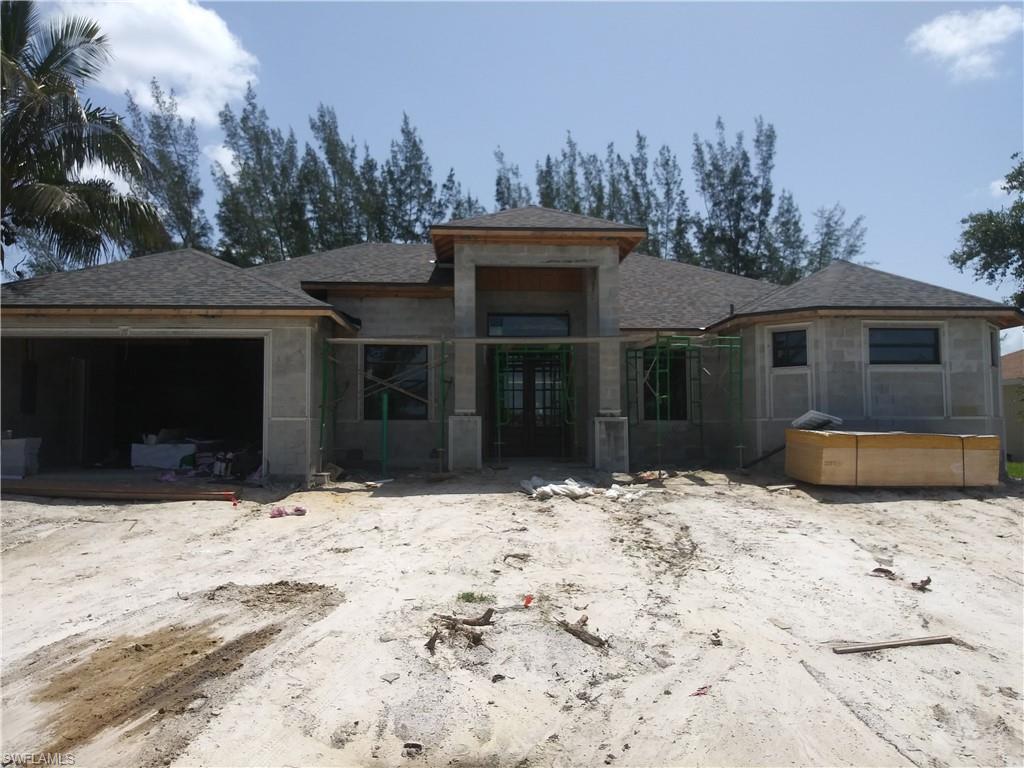 ***New Construction Listing***This gorgeous freshwater canal home features an open floor plan with 3 bedrooms + den, 2 baths, an outdoor shower,2 car garage. Home offers many upgrades such as tile troughout, granite countertops in kitchen and bathrooms, wood cabinets, stainless steel kitchen appliances, sprinkler system, and many more. House will be ready in two months.