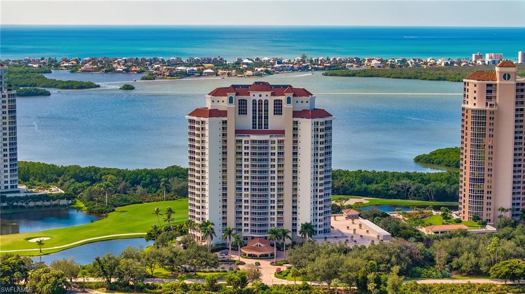 This beautifully furnished 17th floor residence offers a light, bright, and exceptionally spacious interior. Floor to ceiling sliding glass doors open to three west and south facing terraces, showcasing sweeping views of the Gulf of Mexico, Estero Bay, and surrounding golf courses from every room. The primary west facing terrace is enclosed with glass, creating an all season space to enjoy sunsets and views of Estero Bay. The centrally located kitchen features stainless steel appliances, designer countertops, a wine cooler, and slide out shelving, and flows easily into the dining area and a sun filled breakfast room. Neutral 18 inch diagonal tile enhances the sense of openness throughout the main living areas.
Additional features include two under-building parking spaces and a separate air conditioned storage space. Vistas offers 2 guest suites, updated communal areas with social room, card room, fitness center, and workshop. Vistas also has a spacious pool and spa with a bar and grill area. Bonita Bay has 5 golf courses, 15 court tennis center, 18,000 sq. ft. fitness center, 8,000 s.f. Lifestyle spa & salon, full-service marina, Gulf front beach park, 6 restaurants, 15 pickle ball courts, croquet, bocce ball, canoeing, life enrichment center, 3 parks & more.