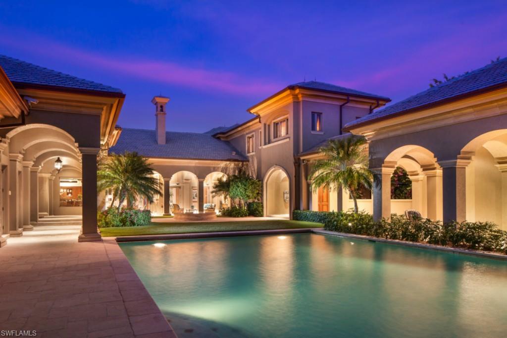 PRICED BELOW APPRAISAL - Welcome to this resort like courtyard pool home with lush landscape located in the very exclusive gated community, Point Verde within Pelican Bay. Featuring its own movie theater room, play room, mother an law suite, custom library, luxurious formal family room and dinning room with butlers pantry, wine room and bar. Nothing like this exists in all of Pelican Bay!  Truly a must see with endless upgrades and fine architect finish which will wow you and give you full appreciation for Luxurious Florida living at its finest. This over 1 acre compound, with a home just under 10,000 sq ft of living area has hosted several charity events, weddings, fashion shows, private parties and much more. Truly the ultimate ideal home for Family holidays and entertaining. Ideally located in one of Naples most prestigious golf, tennis and beach communities between Waterside Shops, the Ritz Carlton and Mercato Shops.   Owner is now retired, Daughter is off to college so he's is ready for a change