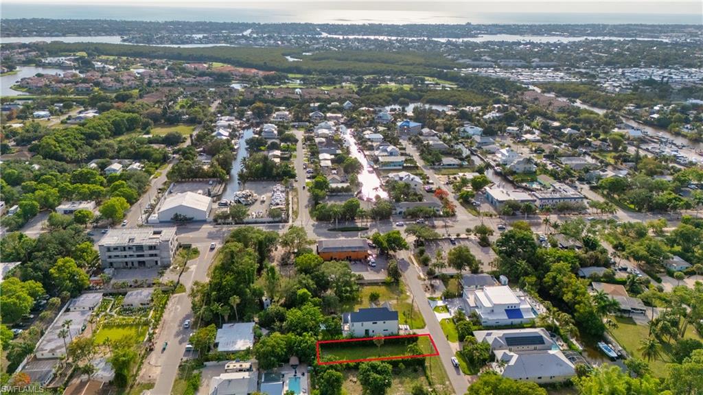 Approximately 0.15 acres zoned residential for single-family or duplex development. This fully upland, level lot offers public utilities and NO HOA, creating an exceptional opportunity to build in the rapidly growing Bayshore District of Naples. Located at 3010 Coco Avenue, this homesite is surrounded by new coastal-inspired construction and luxury residences, making it the perfect setting for a custom home tailored to your lifestyle providing endless potential. Minutes from Downtown Naples, 5th Avenue South, Gulf beaches, marinas, dining, shopping, and entertainment, the location offers both convenience and long-term value. Enjoy close proximity to Celebration Park, Naples Botanical Garden, Rebecca's Wine & Jazz Bar, local cafés, art galleries, and the expanding collection of restaurants and lifestyle destinations that continue to transform the Bayshore area. With inventory becoming increasingly limited in this evolving area, 3010 Coco Avenue presents a rare opportunity to secure a prime piece of Naples real estate and build your dream home!