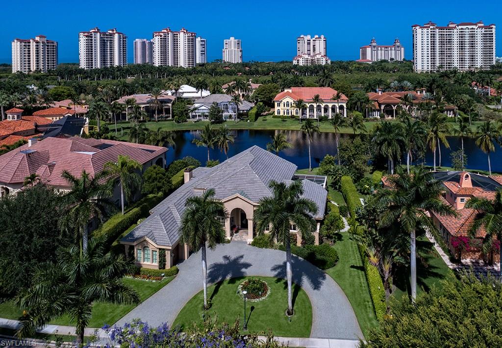 This elegant lakefront home is situated in the beautiful Bay Colony Shores neighborhood within the private and exclusive gated community of Bay Colony. Nestled along a romantic lakefront setting with western exposure, this 5 bedroom home was designed for comfortable living and lavish alfresco entertaining with its well-equipped outdoor kitchen and screened lanai. When entering this exceptional residence, one's eye is immediately drawn to the serene lake waters beyond. The 5,499 square foot home is remarkably elegant, yet warm and comfortable, offering the ability to relax in one of the two dedicated private den spaces. Inquire about renovations by London Bay Homes which include windows and doors. Enjoy a lifestyle unrivaled with such amenities as the luxurious Bay Colony Beach Club and tennis facilities.