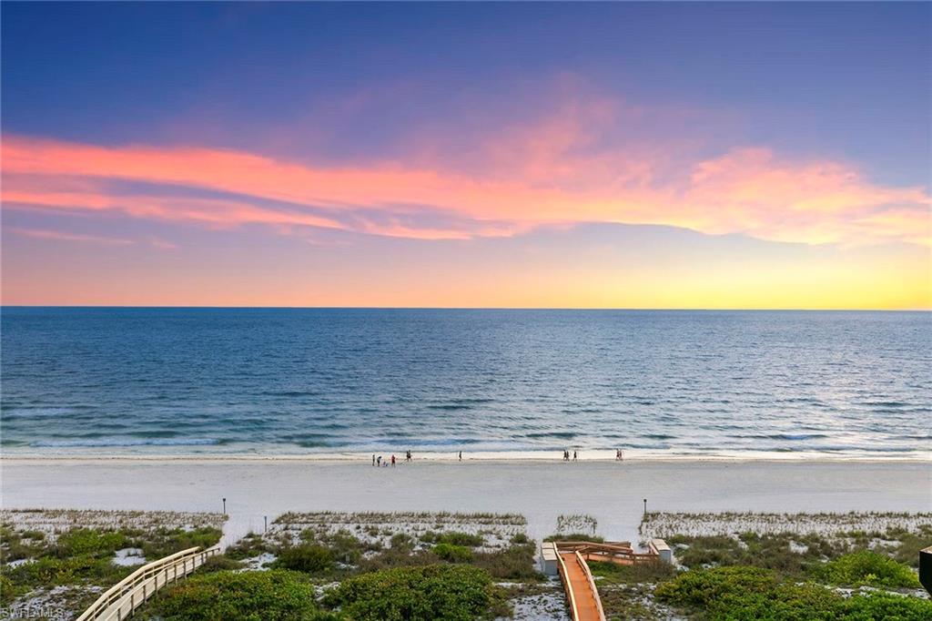 On the Gulf in Sandcastle I, this two-bedroom, two-bath condominium enjoys a sought-after south-side position in the building, where beach views, sunny southwest exposure and sunset skies are among its most compelling features. The split-bedroom floor plan offers privacy, and the residence includes impact-resistant windows, hurricane shutters and an in-unit washer and dryer. Sandcastle I offers a large pool and spa, barbecue grills, tennis and pickleball courts, an exercise room, a social room, assigned covered parking, extra storage and a panoramic glass elevator. On the south end of Marco Island, this location provides convenient access to Marco Walk Plaza, home to some of the island’s popular dining, shopping and entertainment.
