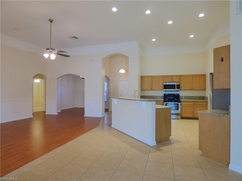 PRICE REDUCED. Seller listened to feedback, and addressed the only negative - paint.  The home just got a new interior coat of paint, and looks gorgeous! Located in a fantastic neighborhood near Sandoval in the sought after SW section of Cape Coral, this impressive home sits on a quiet, low-traffic street. You'll have plenty of room and high ceilings, with 4 bedrooms, 2 bathrooms, walk-in closets, and a 3 car garage. The kitchen has plenty of space, granite counter tops, stainless steel appliances, and an island/breakfast bar that allows you to entertain your guests, with unobstructed views of the living room and dining room.  The master bedroom has upgraded flooring and private pool access. The master bathroom has separate "his and hers" sinks and walk-in closets, a garden tub, and a walk-in tiled shower. The guest bedrooms offer plenty of size and have new carpeting and paint. The guest bath has private access to the pool. And of course, living in Florida, a pool is a must. That is what the Cape Coral lifestyle is all about. You'll enjoy your large heated pool 365 days per year. More: Indoor laundry, washer and dryer, automated sprinkler system, security system, and 2 pantries.