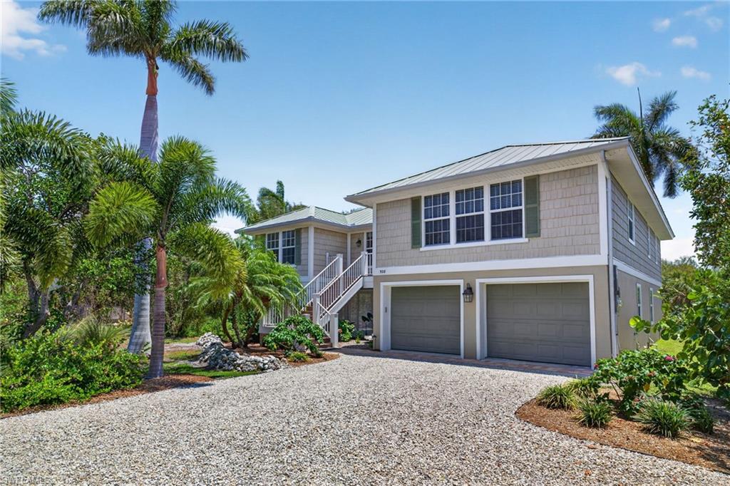 Perfectly positioned within the highly sought-after Gulf Pines community, 928 Pepper Tree Place offers the ideal blend of luxury, privacy, and island convenience—just steps from the beach path and the community clubhouse, pool, and tennis courts. Backing to a serene preserve for added privacy and natural beauty, this timeless residence captures the essence of refined coastal living. Inside, Mirage White Oak Hardwood Floors flows throughout the home, while cedar ceiling detailing in the living room adds character and architectural charm. The thoughtfully updated kitchen features sleek quartz countertops, premium finishes, and an induction stove designed for modern living and effortless entertaining. Updated bathrooms continue the home’s elevated aesthetic with stylish, contemporary finishes throughout. Built for both comfort and peace of mind, the property includes impact windows and doors, a standing seam metal roof, an elevator, and a new whole-house generator. Combining timeless design with exceptional functionality in one of Sanibel’s most desirable beachside communities, this Gulf Pines retreat offers a rare opportunity to enjoy the very best of island living.