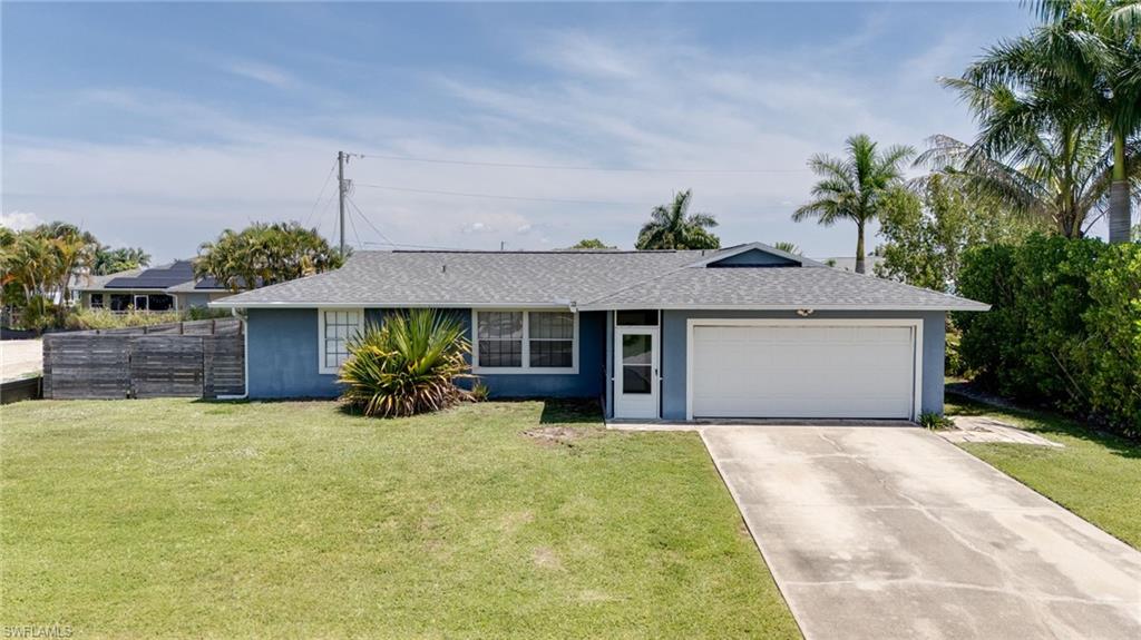 Welcome to your future home in this desirable SW Cape Coral area with all assessments paid! This single-family home boasts 3 bedrooms, 2 bathrooms, and a 2-car garage, providing ample space for you and your family. The modern kitchen features granite counters, stainless steel appliances, and updated laminate flooring, perfect for entertaining guests or enjoying a quiet night in. With room for a pool, you can relax and unwind in your own fenced in backyard oasis with complete privacy. The new air conditioner installed in May 2026 ensures your comfort year-round, while the newer roof in 2022 provides peace of mind for years to come. Nestled in a quiet neighborhood, this 1,116 square foot home offers a serene retreat from the hustle and bustle of everyday life.  Don't miss out on the opportunity to make this house your forever home - schedule a showing today and start living the life you've always dreamed of!