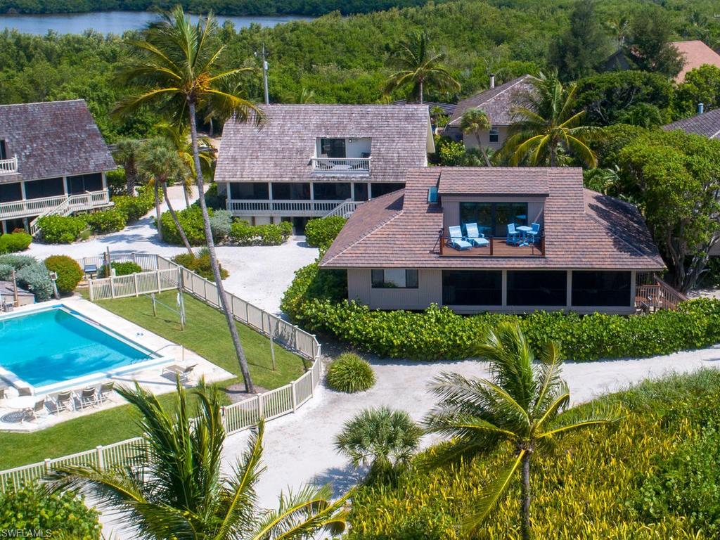 Awesome 180 degree Gulf Views from this total re-done Beach Home in South Seas. Remodel in 2016 added second floor master suite and reconfigured 1st floor to include 2 en-suite bedrooms (1 King and 2 Queen) and a 1/2 bath. The open living area has cathedral ceilings with white-washed pine ceilings. The kitchen has all top end appliances and a one of a kind glass over copper island that seats 8. All bathrooms feature Cambria counter tops and tile showers. The captivating master suite has unparalleled views from the private deck. The master bathroom has 2 sinks and a double head shower with skylight. All exterior decks are I pe. All new plumbing, electrical, insulation,impact windows, tile roof and additional support pilings plus much more. This is a truly exceptional property.