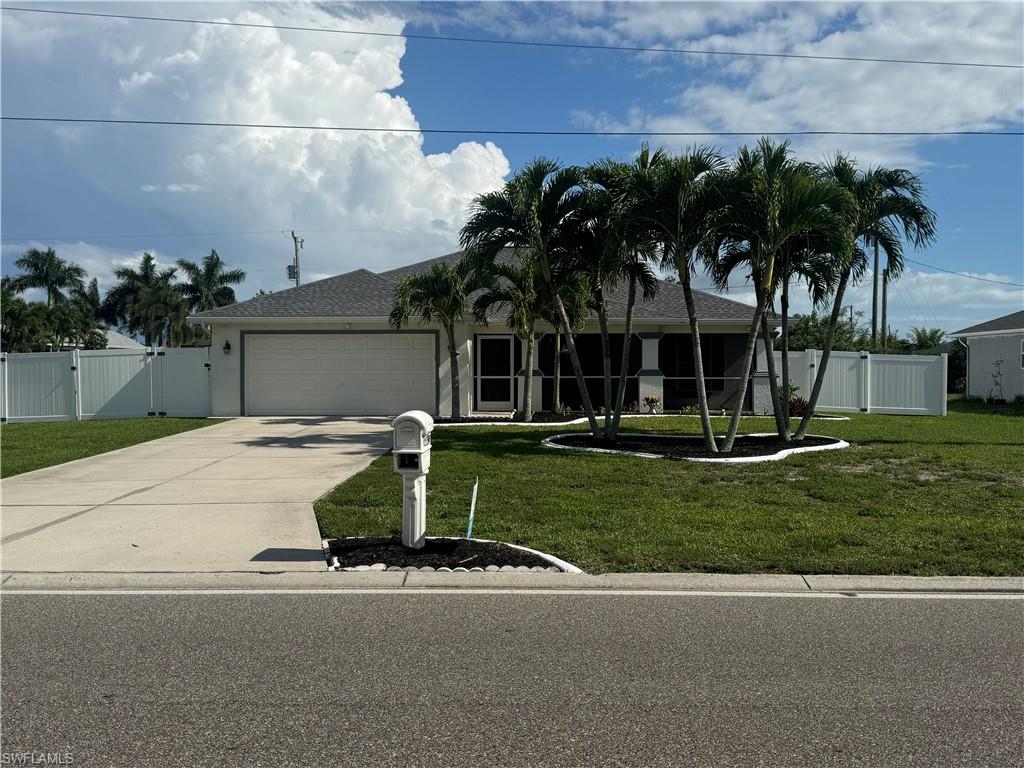 Beautifully renovated 3-bedroom, 2-bathroom home with a den, offering modern upgrades and move-in-ready convenience. Features include fresh Sherwin-Williams paint, tile flooring throughout, a fully remodeled kitchen with new cabinets and quartz countertops, and beautifully updated bathrooms with new vanities, toilets, tub, walk in shower and fixtures.

Enjoy the spacious screened lanai with new screens and a fully fenced backyard offering exceptional privacy. The tropical backyard features mature mango, guava, and avocado trees, along with beautiful palm trees, and plenty of room for a pool and screen enclosure.

As is, all appliances, washer and dryer are included. Clean, well-maintained, and ready for its new owners!

This property is connected to city water, with assessments paid in full.