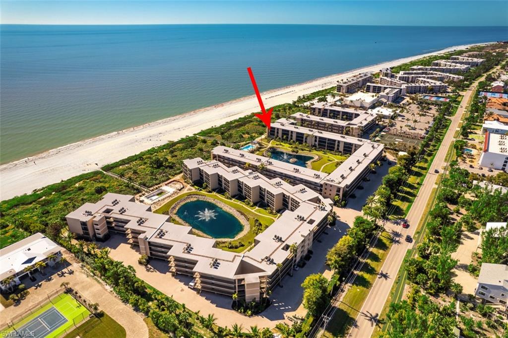 Experience easy island living in this two-bedroom plus den, two-bath 3rd floor corner unit condominium with wide, panoramic views of the Gulf of Mexico. The spacious wraparound balcony offers a front-row seat to the Gulf and plenty of space to unwind! Inside, the open living and dining areas flow comfortably into a fully equipped kitchen, creating a practical layout for everyday living or hosting guests. The primary suite features a king bed and an ensuite bath, while the guest bedroom includes both a queen and twin bed to comfortably accommodate family and friends. A separate den provides flexible space for visitors, a home office, or additional sleeping space. The unit is offered fully furnished and includes a stackable washer and dryer, owner’s closet, and impact-rated doors and windows for added peace of mind. Sundial East residents enjoy three pools, BBQ grills, assigned under-building parking, extra guest parking, an on-site manager, and a convenient ground-level storage closet. Sundial Resort complex is a short walk away that offers pickleball and tennis courts along with popular waterfront dining options, including Sea Breeze Café, Turtles Tiki Bar, and Shima Japanese Steakhouse. 
If you’re looking for a comfortable, low-maintenance place to enjoy Sanibel’s beaches, shelling, biking, kayaking, and wildlife, this is a wonderful opportunity to make your place on the island.