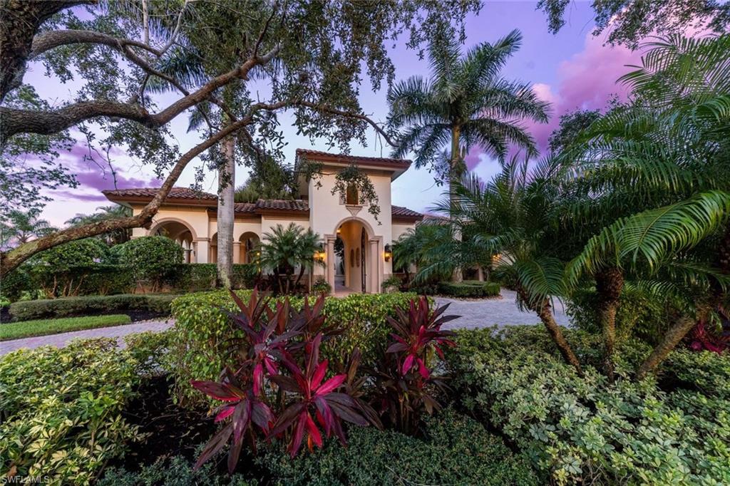 This truly stunning Estate home in Quail West offers a beautiful balance of indoor and outdoor space.  The impressive gated entrance through the courtyard opens into the foyer and living room.  Luxury abounds in the newly renovated chefs kitchen with 3 inch thick Taj Mahal quartzite countertops and backsplash and Viking and Thermador appliances.  The over 6500 square feet of living space includes an enormous brand new custom backlit stone bar in the game room, luxurious master suite with fireplace, wet bar and french doors overlooking the pool and golf course, a huge personal study located in the master wing with mahogany built ins and private entrance leading to the courtyard, and three additional bedrooms each with a bath ensuite and french doors opening to an outdoor courtyard.  The stunning outdoor space includes a newly enlarged living space, resurfaced, re tiled saltwater pool with lighting accents and fire bowls and overlooks the 10th fairway of the Preserve Course. Come see this beautifully elegant home and the numerous improvements today.  This home is being sold with a transferrable Golf Membership and paid assessment.