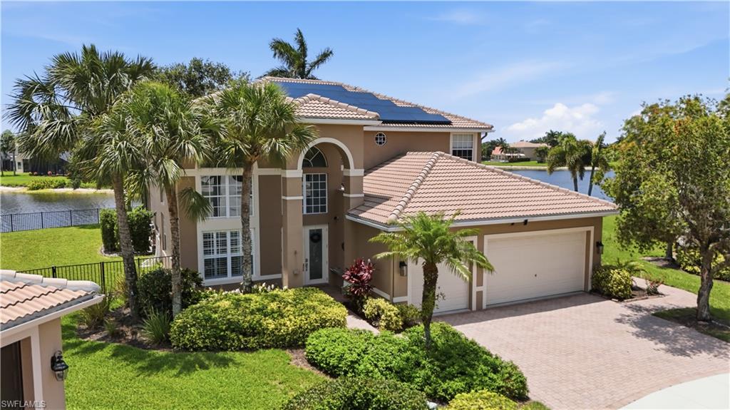 Spectacular Lakefront Living in Saturnia Lakes! Welcome to this stunning cul-de-sac residence offering breathtaking 180-degree panoramic water views and nearly 4,000 square feet of spacious living. This highly sought-after floor plan features 4 bedrooms plus a loft, 3.5 bathrooms, and an open-concept design perfect for both everyday living and entertaining. Step inside to soaring 20-foot volume ceilings and a bright, open layout centered around a beautifully designed kitchen with a large island overlooking the main living areas. The expansive first-floor primary suite provides a private retreat with two oversized walk-in closets and a dedicated office or sitting area. Upstairs, you’ll find three additional bedrooms, two full bathrooms, and a versatile loft, along with a large balcony where you can enjoy sweeping lake views. Recent updates include new flooring throughout, while the oversized fenced backyard offers plenty of room for outdoor enjoyment. Energy efficiency is a major bonus with Tesla Solar Panels, providing exceptionally low utility costs. With desirable eastern rear exposure, you’ll enjoy peaceful mornings with sunrise views over the lake and comfortable shaded evenings for relaxing or entertaining outdoors.

Residents of Saturnia Lakes enjoy award-winning resort-style amenities, including two heated pools, a hot tub, updated fitness center, dance studio, internet café, saunas, billiards room, ballroom, clay tennis courts, basketball court, playground, and putting green. Conveniently located just 15 minutes from the beaches and close to shopping, dining, and A-rated schools, this home offers the perfect combination of luxury and lifestyle.

Bonus: A FREE 12-month home warranty is included for added peace of mind.

This exceptional waterfront home combines luxury, efficiency, and an unbeatable lifestyle. Schedule your private showing today!