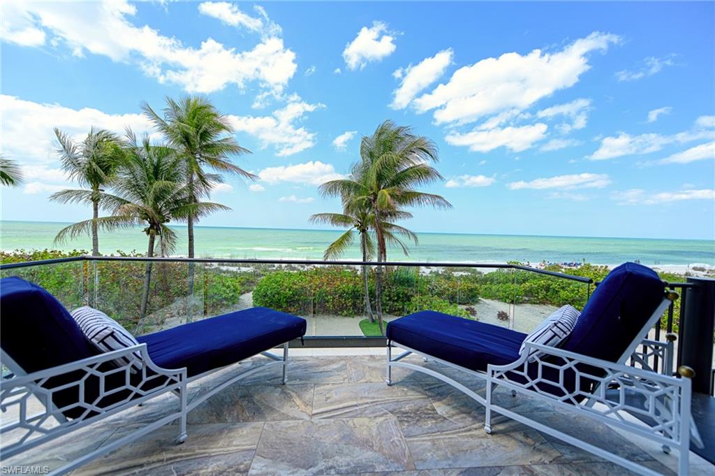 Direct Gulf front Bonita Beach home available!  This immaculate custom home built by DCS offers it all including: open floor plan with wide gulf views, elevated negative edge swimming pool & spa, outdoor covered lanai with electric screens & shutters plus summer kitchen with gas grill & pool bath and glass railings to maximize the gulf views; great room with intricate ceiling details, cabinetry & pocketing sliders to allow for panoramic Gulf views. The main living level includes two private guest suites w/ full baths, guest laundry, custom bar w/ seating, powder bath with triple groin ceiling, dining room on the gulf & a stunning gourmet kitchen that includes a gas range, breakfast bar, large island, back kitchen/butlers pantry & pantry. The 3rd floor features the master bedroom & bath flex/ bonus room, study/home office & full bath plus VIP bedroom & bath. The master bedroom includes a private lanai, fireplace and a spacious bathroom w/ Toto automated toilet, walk-in shower w/multiple shower heads and heaters floors. The flex/bonus room inc custom bar, wood lined ceilings & truss beams, & lanai overlooking the Gulf of Mexico. 6+ car garage. Designer furnished for easy move in.